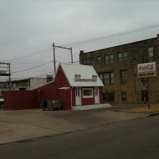 a red building with a white roof