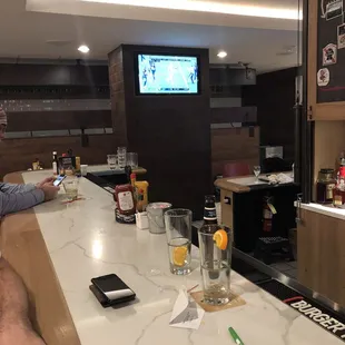 a man sitting at a bar