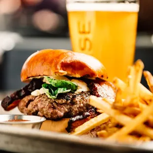 a plate of fries and a glass of beer