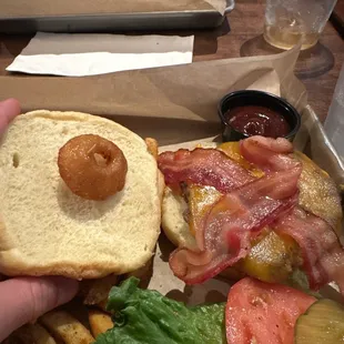The smallest onion ring on the Lone Star burger.