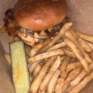 The Ultimate Sriracha Burger with fries