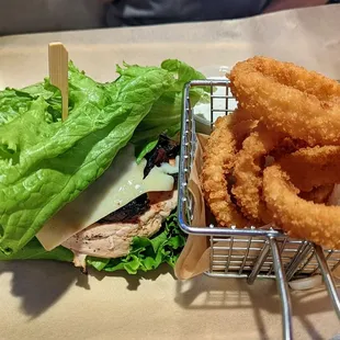 Build your own chicken breast lettuce wrap with grilled mushrooms and swiss and onion rings.