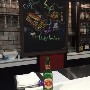 a bottle of beer on a counter