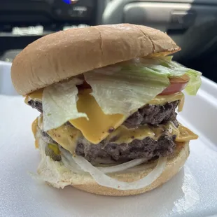 This is The Dbl Cheeseburger, you won't be disappointed and better come hungry because it's fresh burgers that are more than a handful.