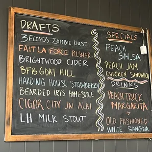 a menu on a chalk board