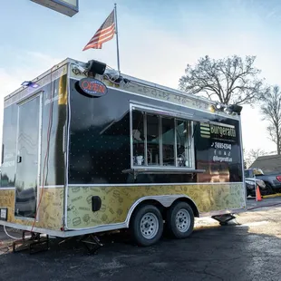 a food truck parked in a parking lot