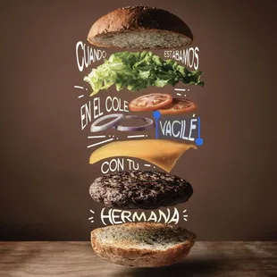 a stack of different types of burgers