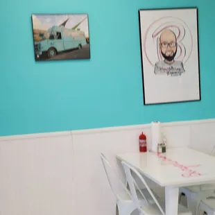 a table and chairs in a restaurant
