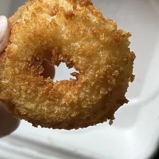 One of the smallest of the onion rings look at that crispy yum!