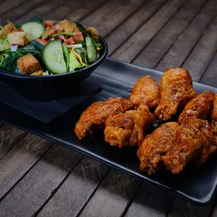chicken wings and a salad