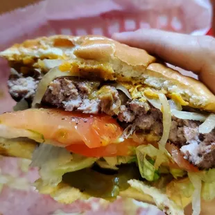 Supposedly a half pound burger cooked medium rare