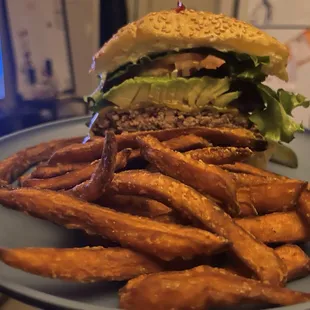 Avocado bacon cheeseburger and sweet potato fries. We had the OG fries but ate em in the car.