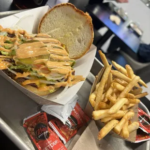 a tray of fries and a sandwich