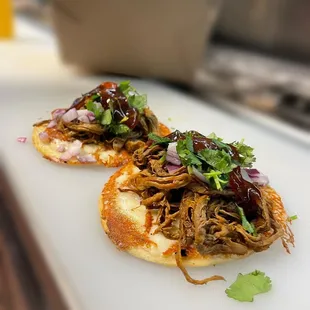 a close up of a bbq sandwich