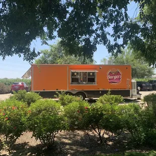 a food truck parked in a parking lot