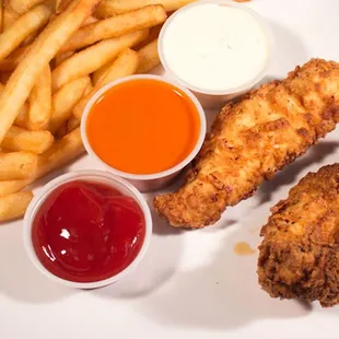 a plate of food with fries and ketchup