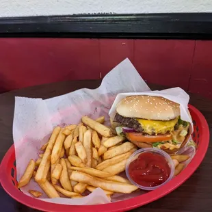 Cheese Burger with jalapenos and fries