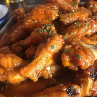 a plate of chicken wings