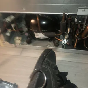 Back panel where the compressor is.