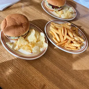 three plates of food on a table
