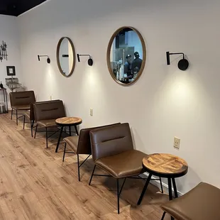 a row of chairs in a coffee shop