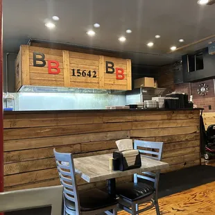 a table and chairs in a restaurant