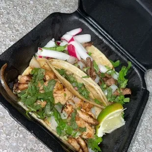 Chicken taco and a steak taco