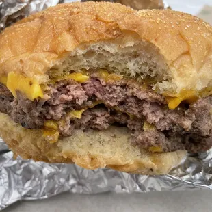 Plain double cheeseburger on a kaiser roll