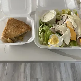 Slice of Apple pie Julienne Salad with random slices of cheese, uncooked egg, and pieces of reused deli meat