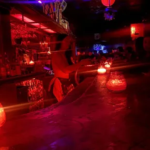 red and blue lights in a bar