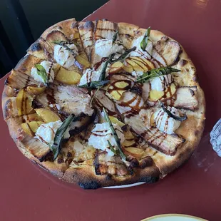 Pork Belly, Ricotta, Peach and Balsamic pizza.