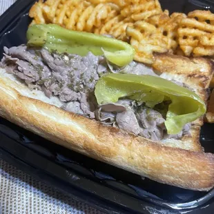 Italian beef and waffle fries.