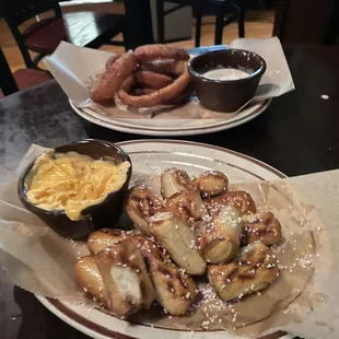 Pretzel bites with beer cheese and onion rings with Guinness sauce. Both great!