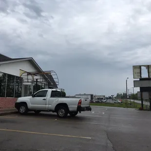 Parking lot and front of building was damaged by tornado over Memorial Day weekend.