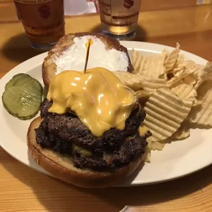 a cheeseburger and chips