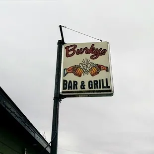 a sign for burkys bar and grill