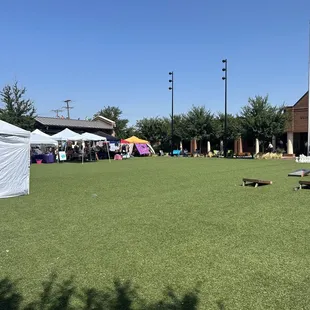 Nice open area and yard games. Vendors on the perimeter and behind this pic