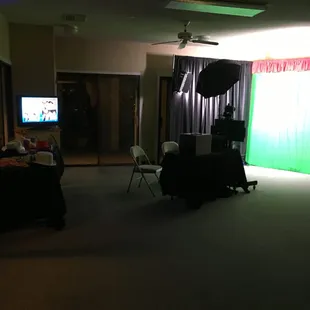 Open, green screen photo booth