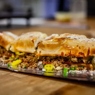 a meat and vegetable sandwich