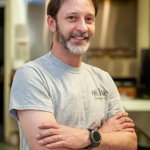 a man standing in a kitchen