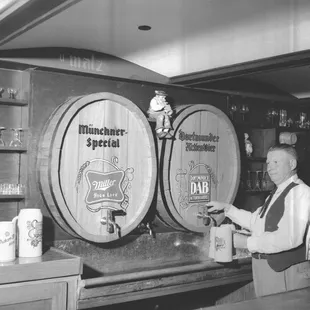 a man standing at the bar