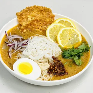 Mohin Gha - one of the most popular dishes in Burmese cuisine. Served with thin rice noodle and fish broth.
