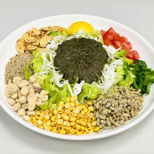 Our best-selling tea leaf salad served with traditional tea leaf dressing and crunchy mix combined with a mixture of fresh vegetables.