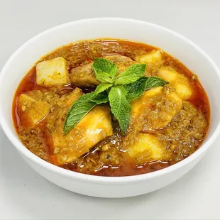 Burmese style chicken curry with potatoes.