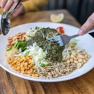 You always have to get a Tea Leaf Salad.