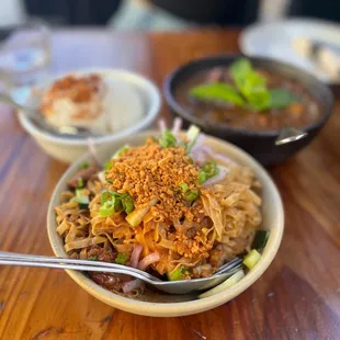 garlic noodles with pork belly, lamb curry with coconut rice