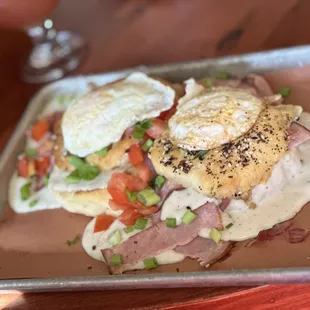 Smothered ham with everything bagel, cheese, and gravy