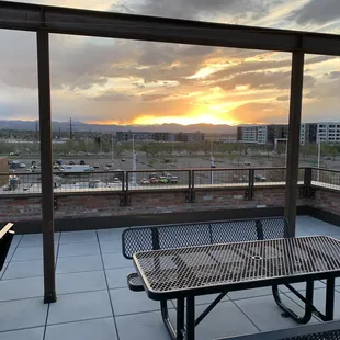 Sunset over South Broadway upstairs patio