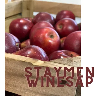 a crate of red apples