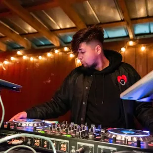 a dj playing music on a turntable